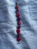 Handmade pink and purple dyed shell bracelet