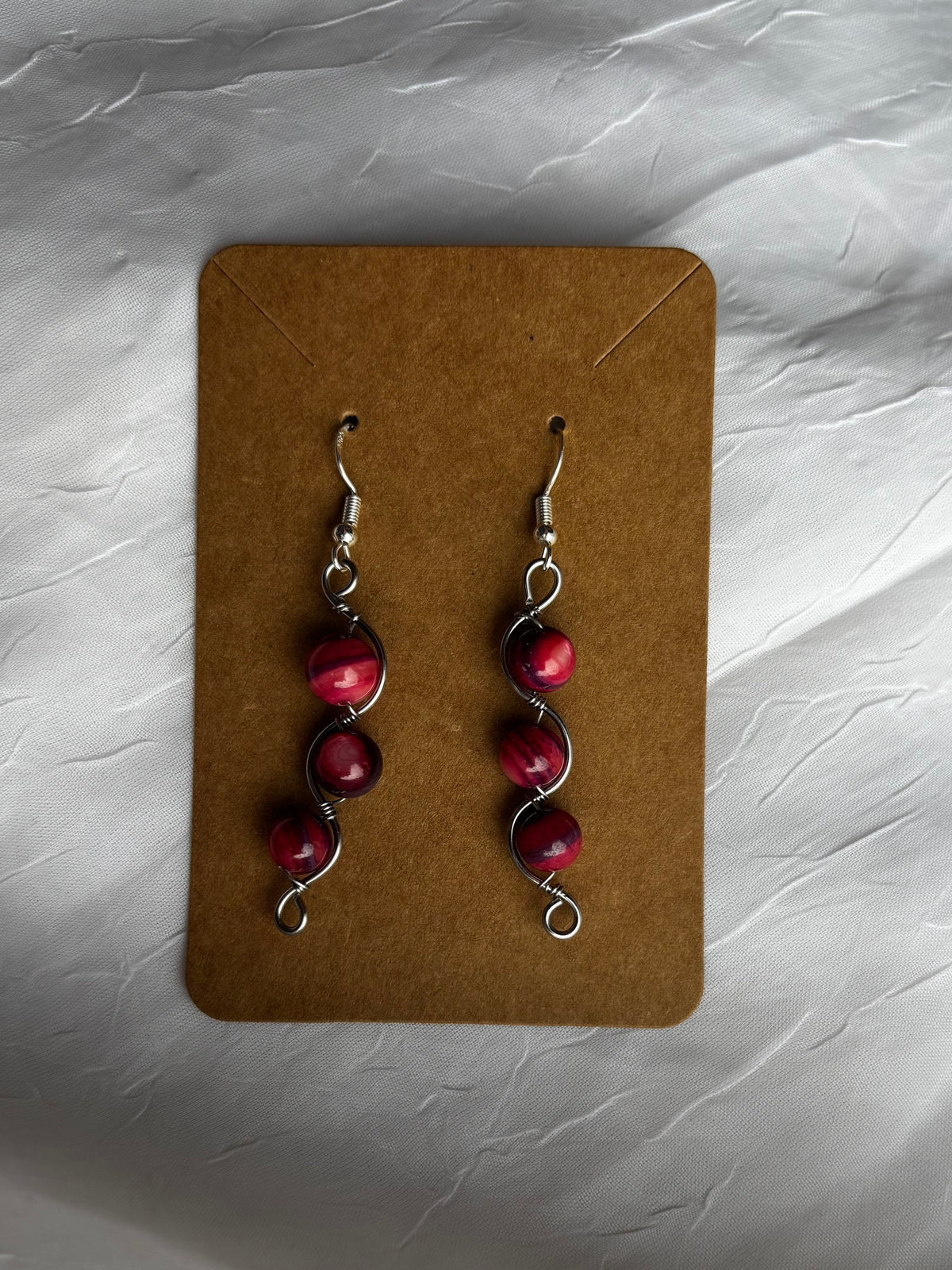 Pink and purple dyed shell earrings